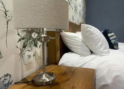 Un ou plusieurs lits dans un hébergement de l'établissement La Montgrande Bed & Breakfast