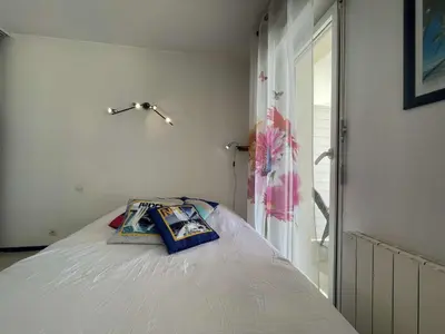 Un ou plusieurs lits dans un hébergement de l'établissement Appt 1 pièce cabine - CHATELAILLON PLAGE - CL090-002