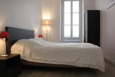 Un ou plusieurs lits dans un hébergement de l'établissement Appt 2 pièces LA ROCHELLE - LR180-024