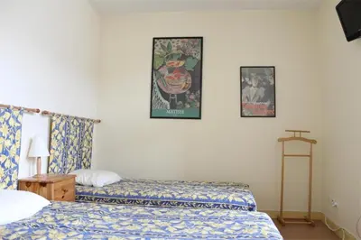 Un ou plusieurs lits dans un hébergement de l'établissement Studio La Rochelle - LR180-010