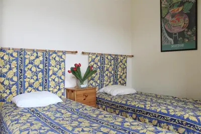 Un ou plusieurs lits dans un hébergement de l'établissement Studio La Rochelle - LR180-010