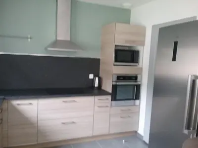 Cuisine ou kitchenette dans l'établissement Maison de vacances 6 personnes