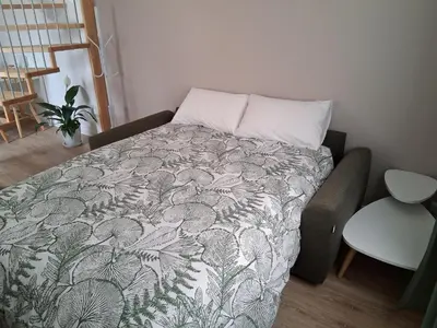 Un ou plusieurs lits dans un hébergement de l'établissement Appart-Hôtel Rouillac
