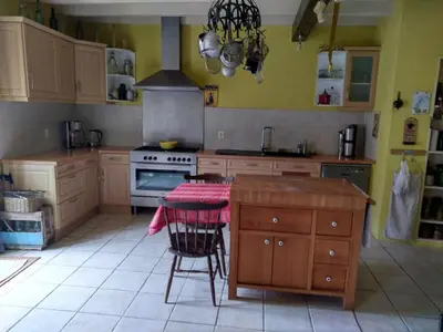 Cuisine ou kitchenette dans l'établissement Maison de famille