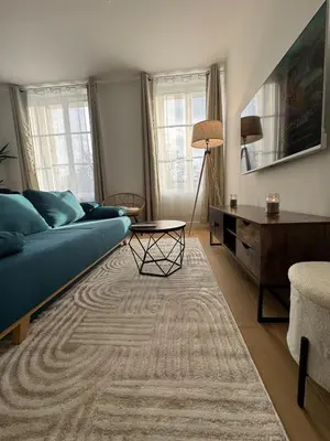 Télévision ou salle de divertissement dans l'établissement El Castillo Face au Château et Climatisé