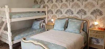 Un ou plusieurs lits dans un hébergement de l'établissement Wisteria House