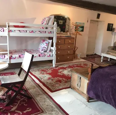Un ou plusieurs lits dans un hébergement de l'établissement Wisteria House