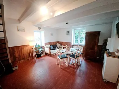 Coin salon dans l'établissement Maison T2 Meublé à la campagne