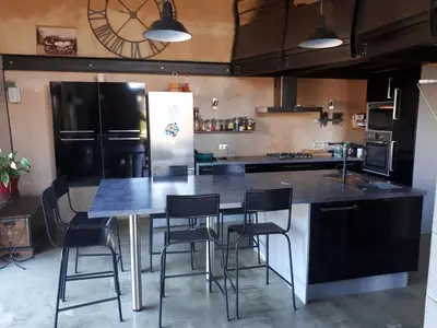 Cuisine ou kitchenette dans l'établissement Grange rénovée