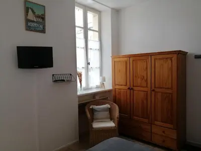 Télévision ou salle de divertissement dans l'établissement Espoumet