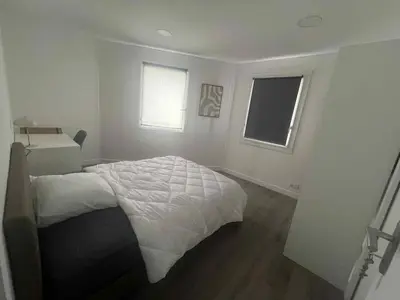 Un ou plusieurs lits dans un hébergement de l'établissement Apt de 110 m2 tout équipé et confortable