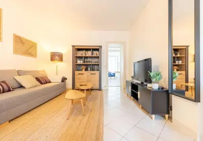 Coin salon dans l'établissement Appartement de l'ammonite