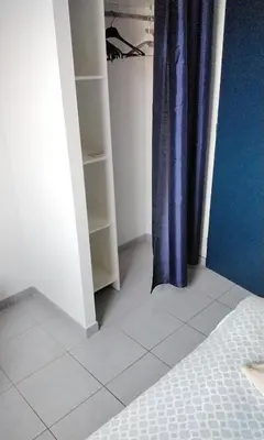 Un ou plusieurs lits dans un hébergement de l'établissement Chambre chez josette