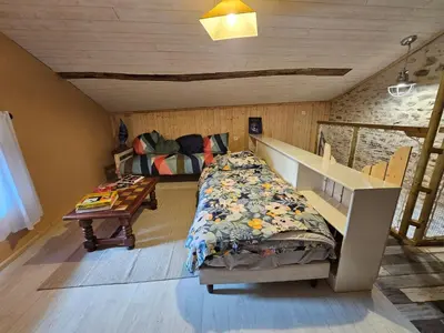 Un ou plusieurs lits dans un hébergement de l'établissement Le Clos du Tramaillou gite La Grand Voile pour 6 S