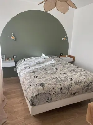 Un ou plusieurs lits dans un hébergement de l'établissement Maison de vacances