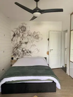 Un ou plusieurs lits dans un hébergement de l'établissement Maison de vacances