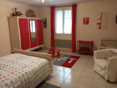 Un ou plusieurs lits dans un hébergement de l'établissement Gîte du Marronnier