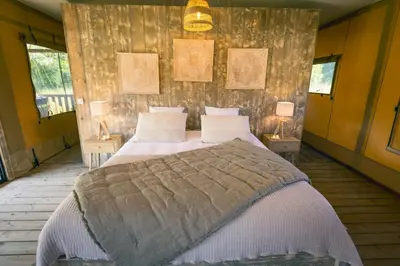 Un ou plusieurs lits dans un hébergement de l'établissement You and Me Glamping