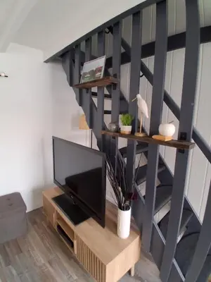Télévision ou salle de divertissement dans l'établissement Grand Studio Mezzanine au calme dans l'hypercentre