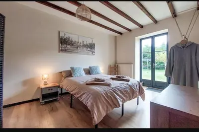 Un ou plusieurs lits dans un hébergement de l'établissement Gite Vigne - stay on a vineyard, overlooking the vines in this 2 bedroomed gite
