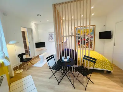Télévision ou salle de divertissement dans l'établissement Le Goldorak, Hyper-centre, Garage privé et Climatisation