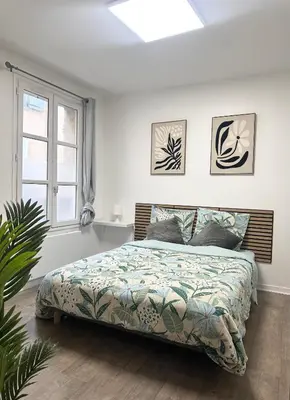 Un ou plusieurs lits dans un hébergement de l'établissement Studio cosy plein centre & parking à proximité