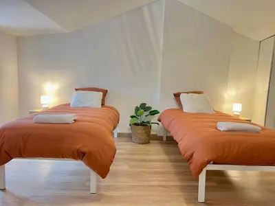 Un ou plusieurs lits dans un hébergement de l'établissement Villa Verde, magnifique gite à 10 min du Futuroscope