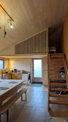 Un ou plusieurs lits dans un hébergement de l'établissement Gîte en matériaux naturels Sauna, couchers de soleil et chevaux