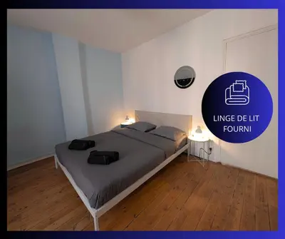Un ou plusieurs lits dans un hébergement de l'établissement Le Jardin d'Angély by CozyLife Central Jardin