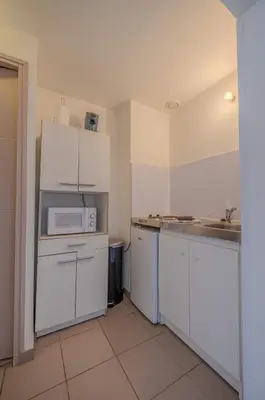 Cuisine ou kitchenette dans l'établissement Sunset Aparthotel Kiwi Residence