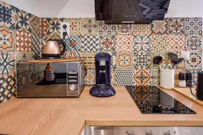 Cuisine ou kitchenette dans l'établissement Le Jardin de Frida by CozyLife - Cœur de Ville