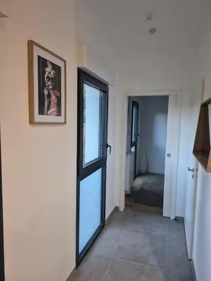 Un ou plusieurs lits dans un hébergement de l'établissement Nina, Appartement 2 couchages, Elégant, Wifi, Parking