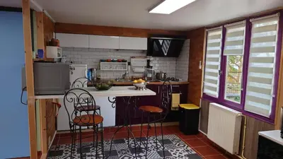 Cuisine ou kitchenette dans l'établissement Chez David