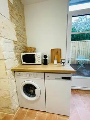 Cuisine ou kitchenette dans l'établissement Cozy apartment Chez Simone