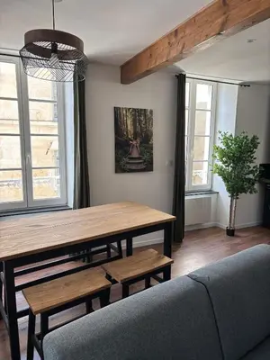 Coin salon dans l'établissement Appartement plein coeur de ville