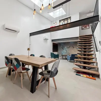 Coin salon dans l'établissement Le loft du canal de Rompsay