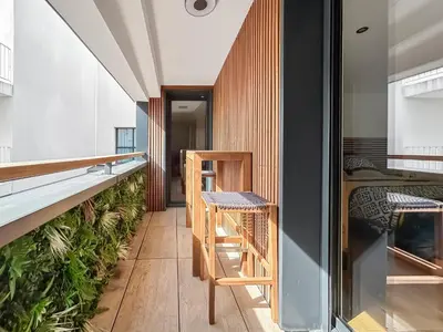 Coin salon dans l'établissement Le loft du canal de Rompsay
