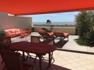 Balcon ou terrasse dans l'établissement Mer & Soleil - Face mer avec accès direct plage