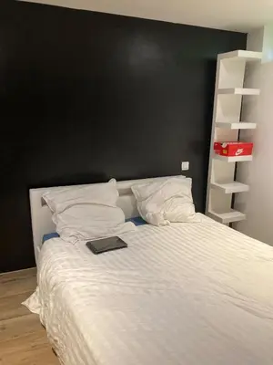 Un ou plusieurs lits dans un hébergement de l'établissement Loft Hyper centre Saintes