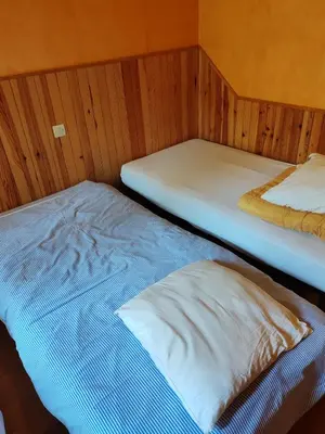 Un ou plusieurs lits dans un hébergement de l'établissement Domaine la butte de Lauray