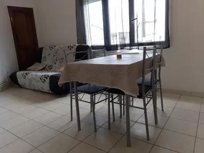 Coin salon dans l'établissement Maisonnette