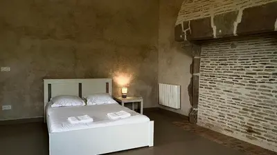 Un ou plusieurs lits dans un hébergement de l'établissement Château de Chausserais - 5 chambres - 4 salles de bain