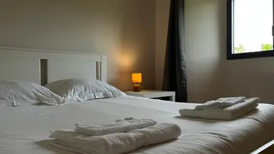 Un ou plusieurs lits dans un hébergement de l'établissement Château de Chausserais - 5 chambres - 4 salles de bain