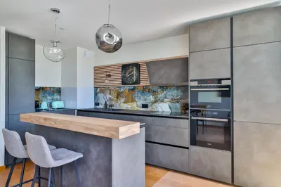 Cuisine ou kitchenette dans l'établissement Maison du bonheur #Haut de Gamme