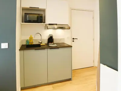 Cuisine ou kitchenette dans l'établissement Le Cocon studio, cognac