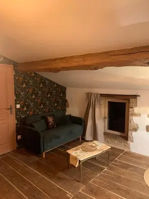 Coin salon dans l'établissement Le refuge du Jardinier