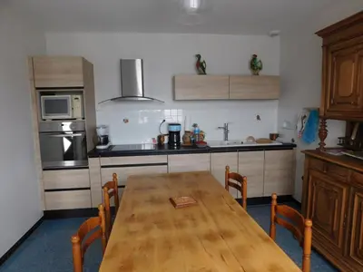Cuisine ou kitchenette dans l'établissement MMR 6 personnes avec cour privée et cloturée