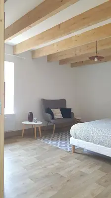 Coin salon dans l'établissement Gîte Le BB
