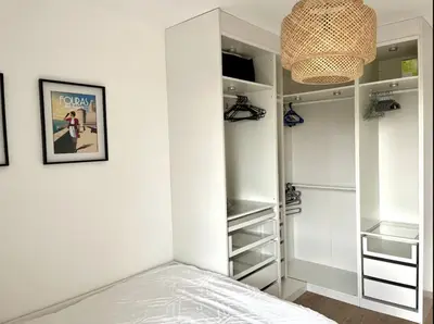 Un ou plusieurs lits dans un hébergement de l'établissement Appartement moderne et spacieux 2 chambres, parking privé