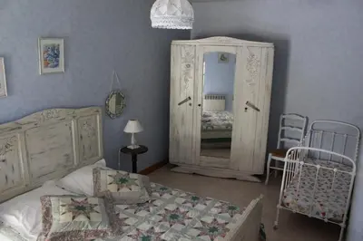 Un ou plusieurs lits dans un hébergement de l'établissement Les Noyers - Maison typique du Poitou - Calme et paisible - Proche du Futuroscope